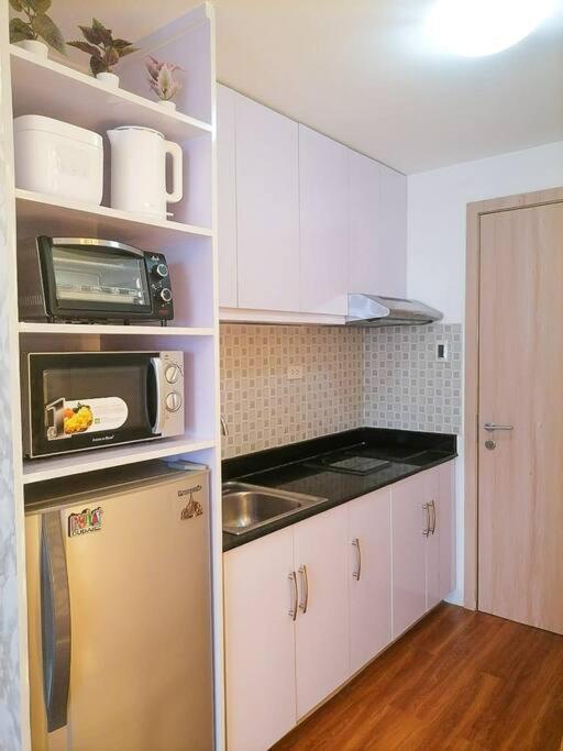 Cozy Studio Unit At Sun Residences Quezon City Eksteriør billede